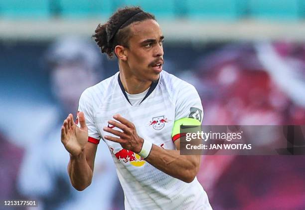 Leipzig's Danish forward Yussuf Poulsen celebrates after scoring the 1-1 during the German first division Bundesliga football match RB Leipzig v SC...