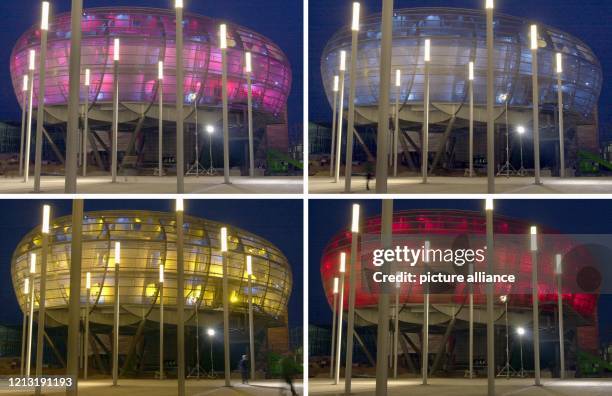 In leuchtenden Farben erstrahlt am Abend des 8.4.2000 auf dem Gelände der Weltausstellung Expo in Hannover der als "Planet m - medien für menschen"...