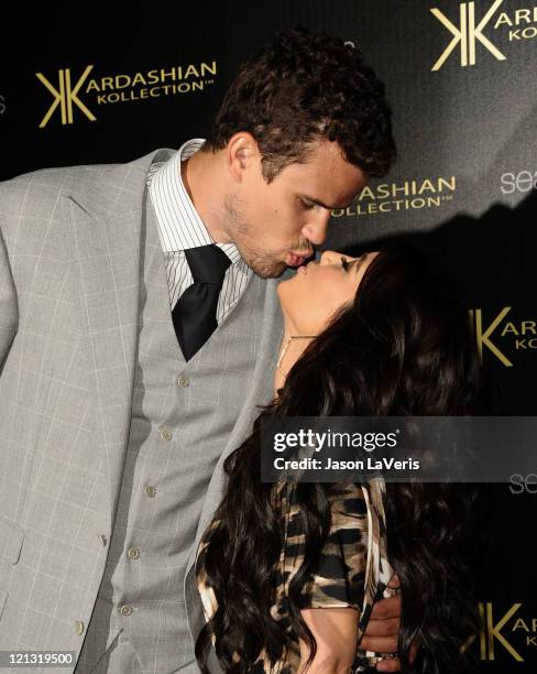 Kris Humphries and Kim Kardashian attend the Kardashian Kollection launch party at The Colony on August 17, 2011 in Hollywood, California.