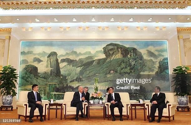 Vice President Joe Biden meets Chinese National Peoples Congress Standing Committee Chairman Wu Bangguo at the Great Hall of the People on August 18,...