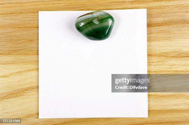 healing crystal on notepaper - paperweight stock pictures, royalty-free photos & images