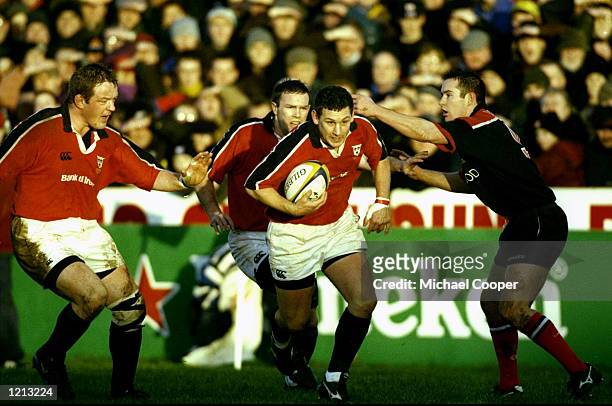 Jason Holland of Munster in action against Saracens during the Heineken Cup Pool 4 match at Thomond Park in Munster, Ireland. Munster won 31-30. \...