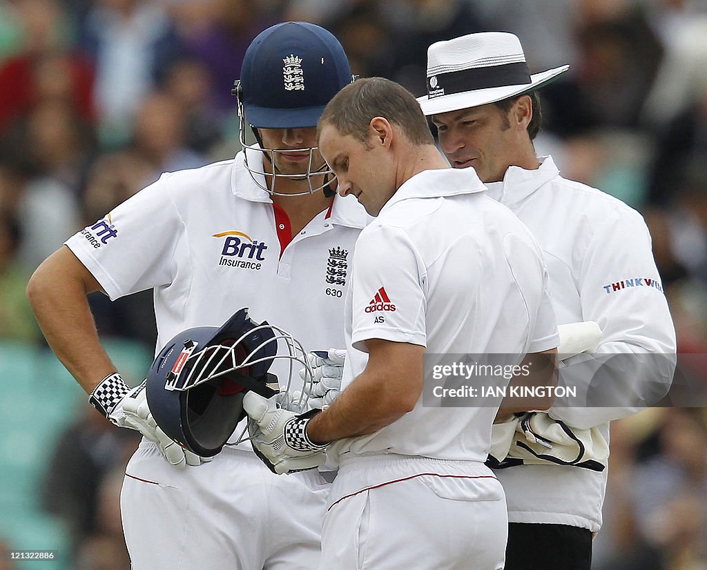 England's captain Andrew Strauss (C) ins