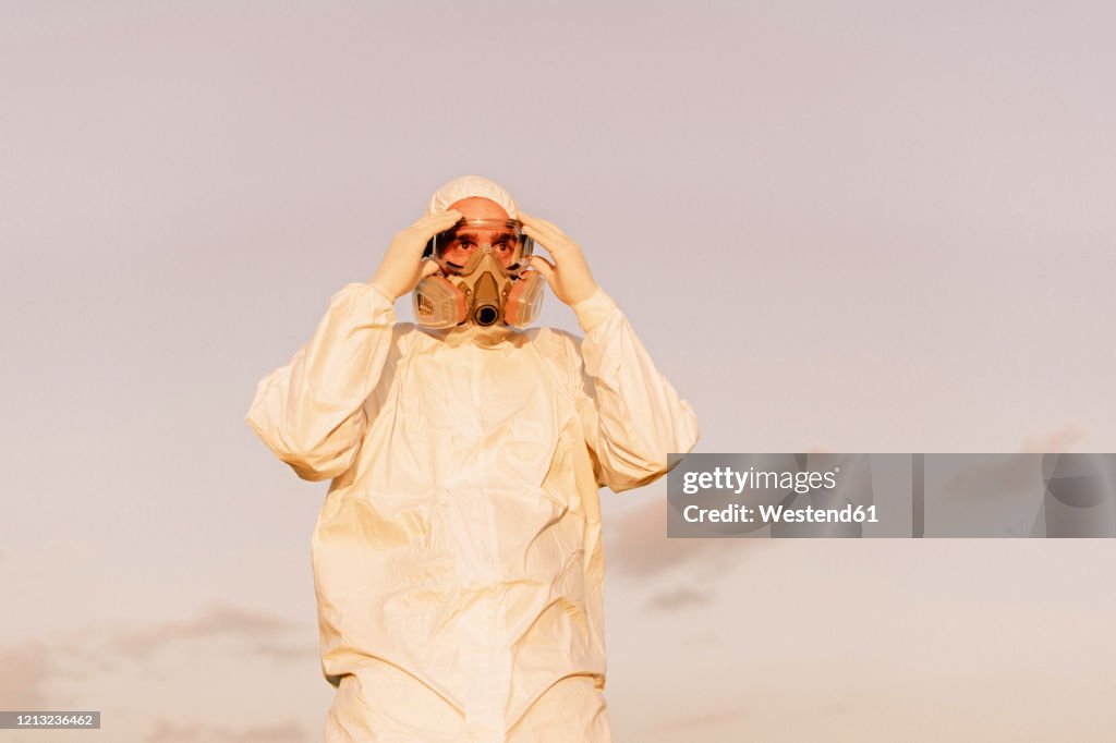 Man Using Protection Portrait Of Man Wearing Protective Suit And Mask High-Res Stock Photo ...