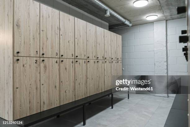 dressing room in a gym - locker room wall stock pictures, royalty-free photos & images