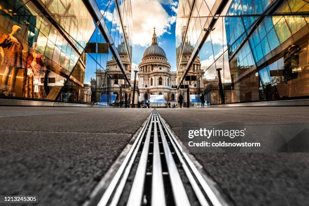 urban crowd and futuristic architecture in the city, london, uk - st pauls cathedral london stock pictures, royalty-free photos & images