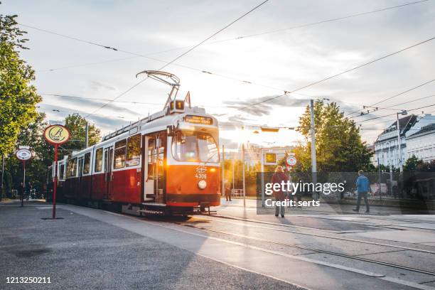 the vintage red ring tram in vienna, austria - vienna concert hall stock pictures, royalty-free photos & images