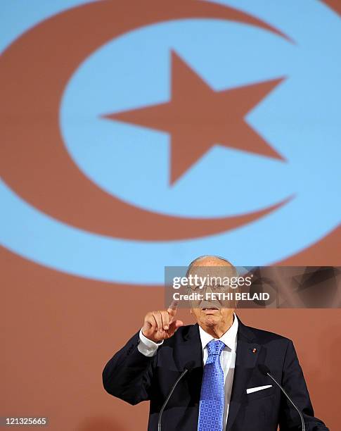 Tunisia's Prime Minister Beji Caid Essebsi addresses the nation during a meeting with Civil society organizations and Tunisians political parties at...