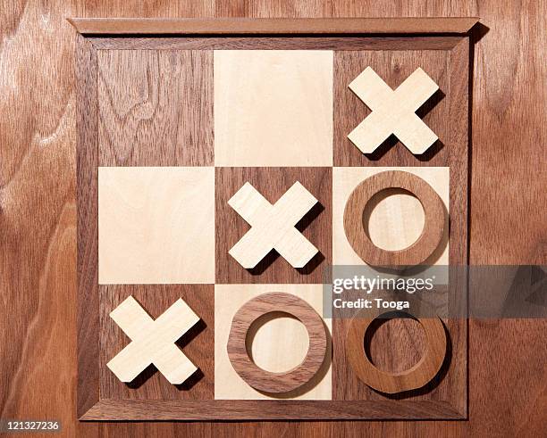 wooden tic tac toe board - tic tac toe stock pictures, royalty-free photos & images