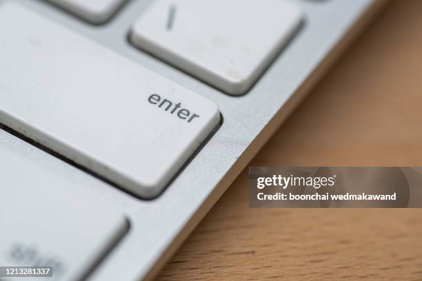 Computer Keyboard Enter Photos and Premium High Res Pictures - Getty Images
