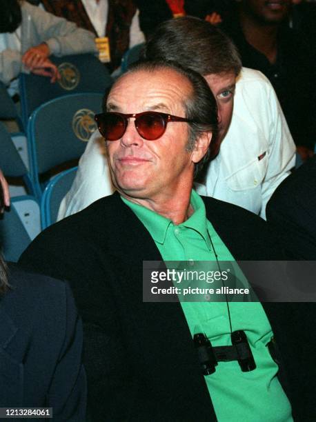 Hollywood-Star Jack Nicholson verfolgt im MGM-Hotel den WM-Kampf zwischen Schwergewichts-Weltmeister George Foreman und seinem Herausforderer Axel...