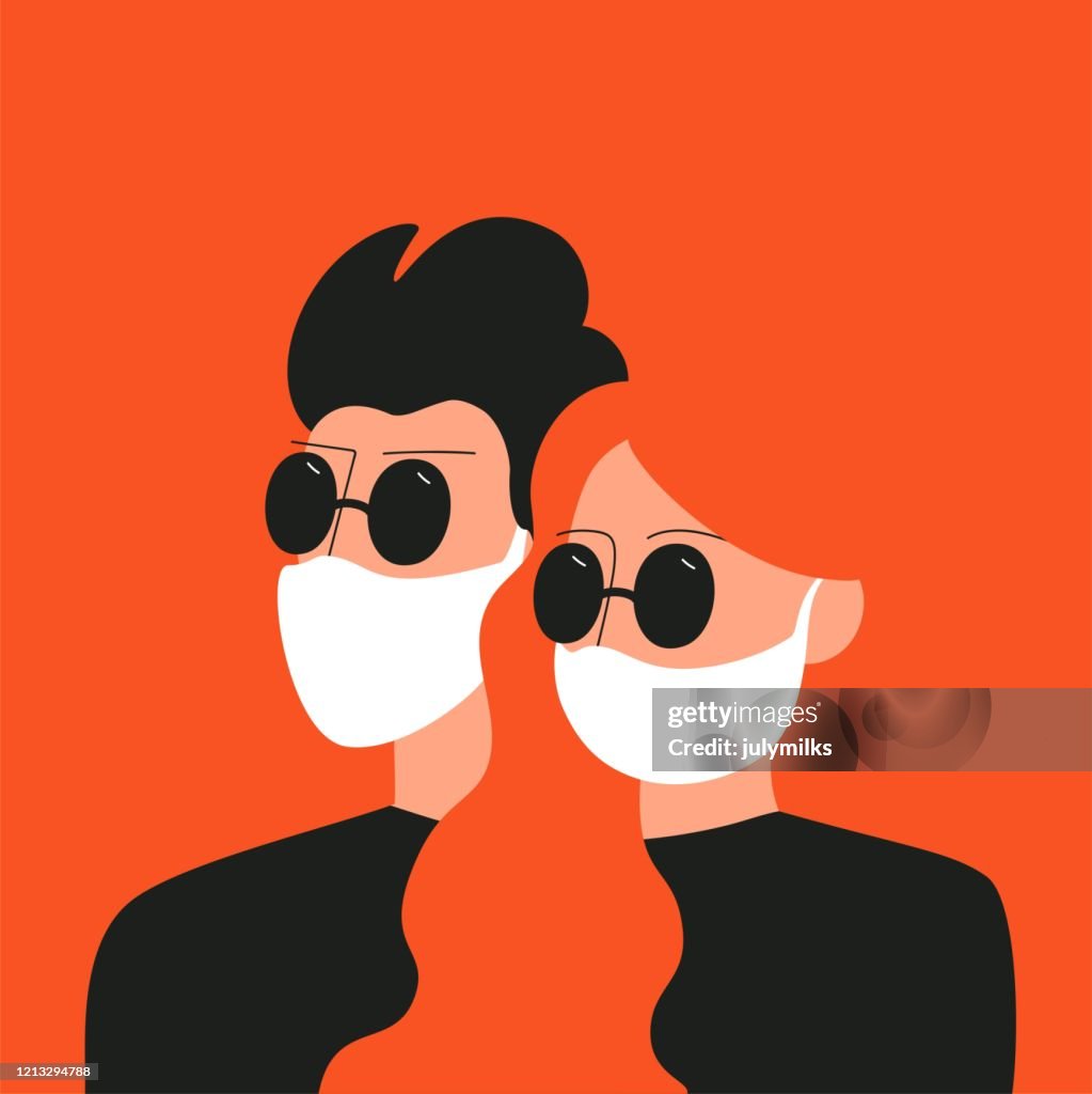 Hombre y mujer con gafas de sol y mascarilla médica. Nuevo coronavirus 2019-nCoV.