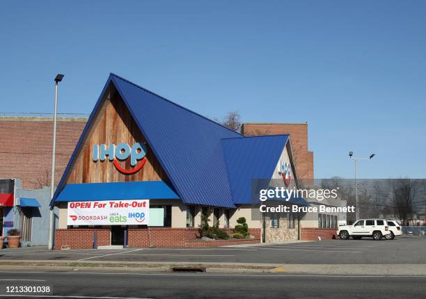 An image of the sign for an iHop restaurant as photographed on March 18, 2020 in Hicksville, New York.