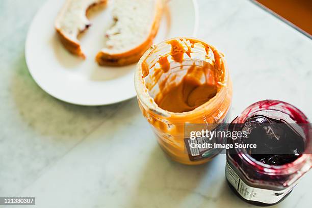 jam and peanut butter sandwich - peanut butter stock pictures, royalty-free photos & images