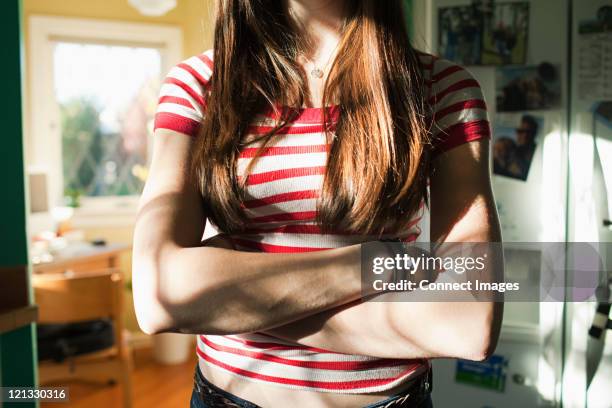 teenage girl with arms crossed - stubborn stock pictures, royalty-free photos & images