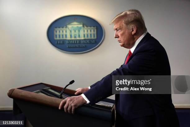 President Donald Trump pauses during a news briefing on the latest development of the coronavirus outbreak in the U.S. At the James Brady Press...