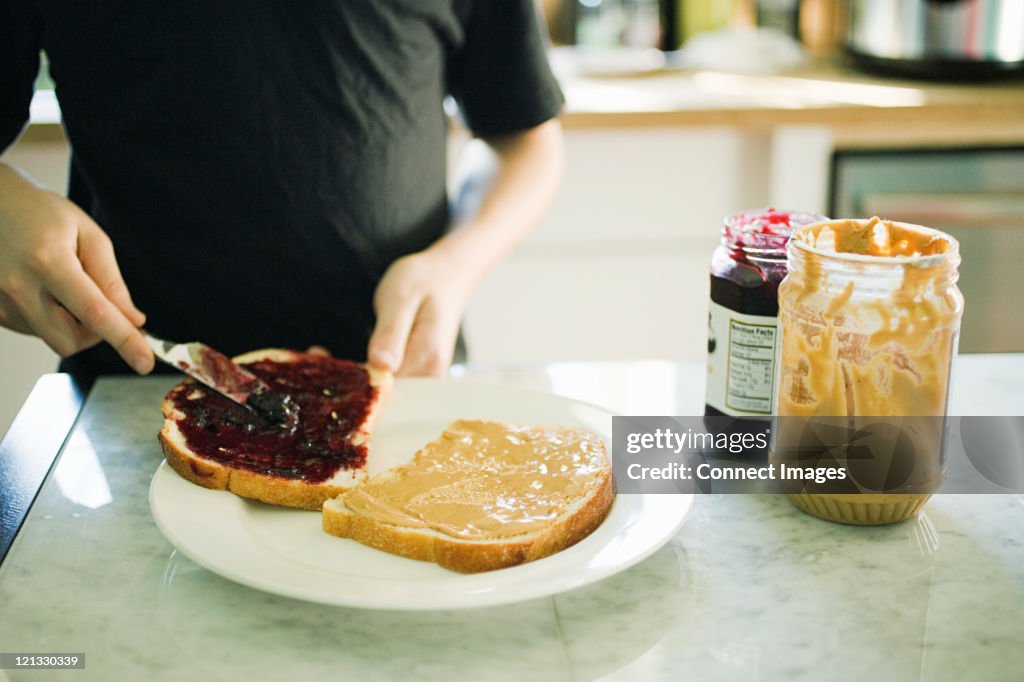 Boy making sandwich