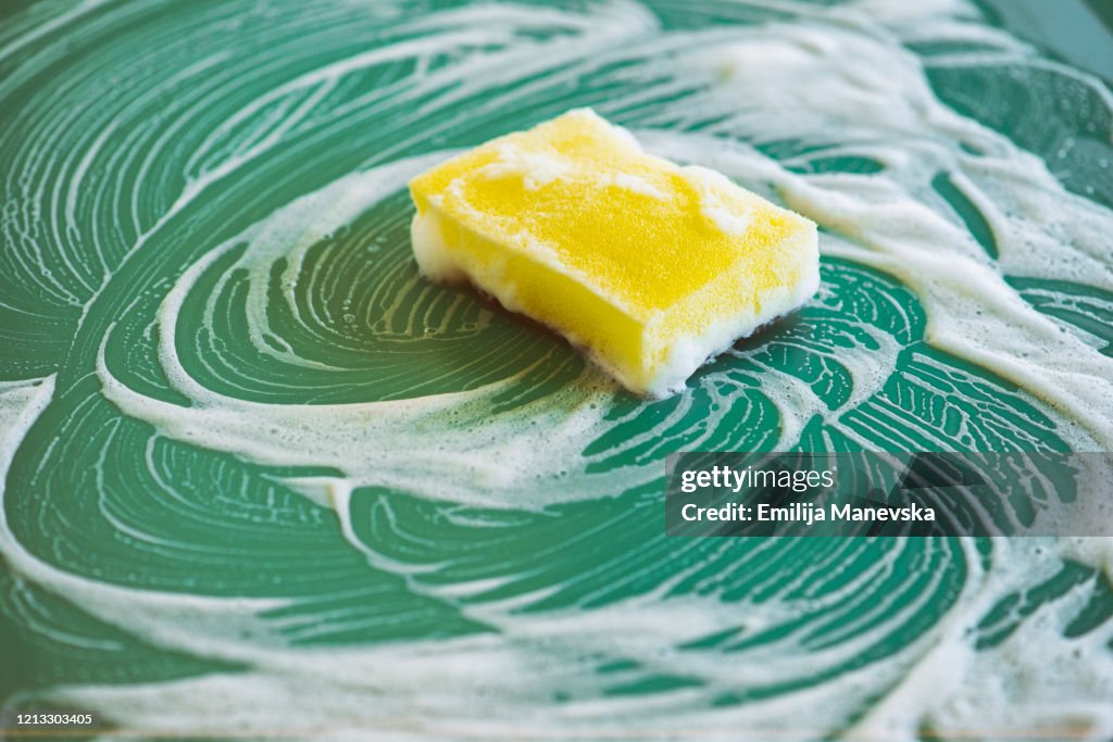 Cleaning with yellow sponge