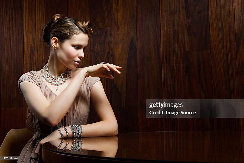 Young woman showing off ring