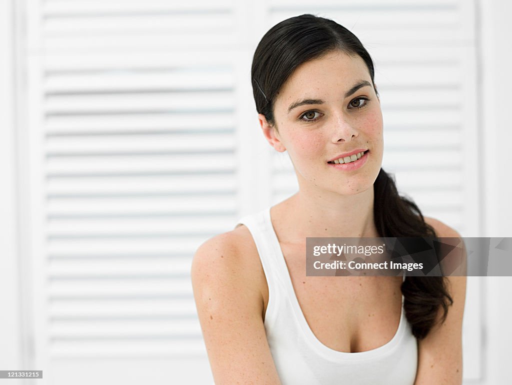 Portrait of young woman in bathroom