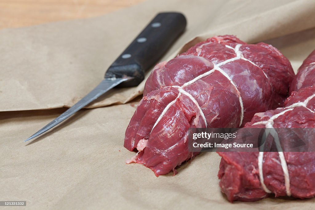 Beef tenderloin, rolled and tied in string