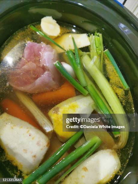 making bone broth - bone broth stock pictures, royalty-free photos & images