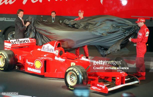 Ferrari-Präsident Luca di Montezemolo, Team-Manager Jean Todt, der deutsche Formel 1-Pilot Michael Schumacher und sein irischer Teamgefährte Eddie...