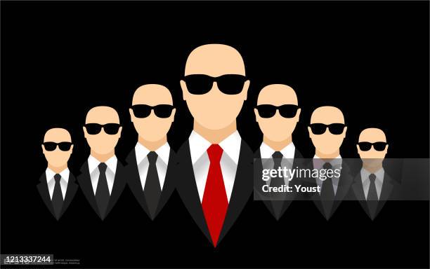 businessmen teamwork in black suits with necktie wearing sunslasses - black suit sunglasses stock illustrations