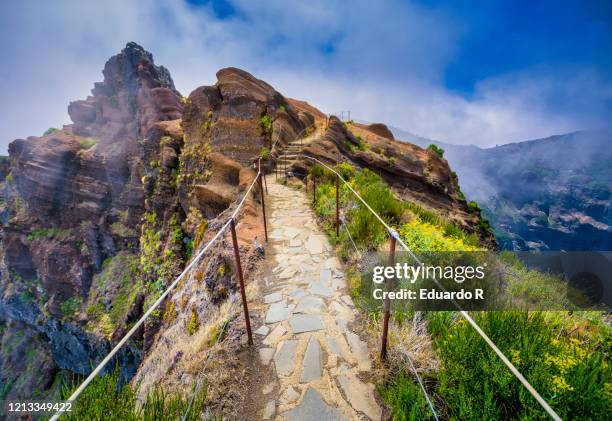 stunning view from dangeous footpath in pico do arieiro in madeira - madeira stock pictures, royalty-free photos & images