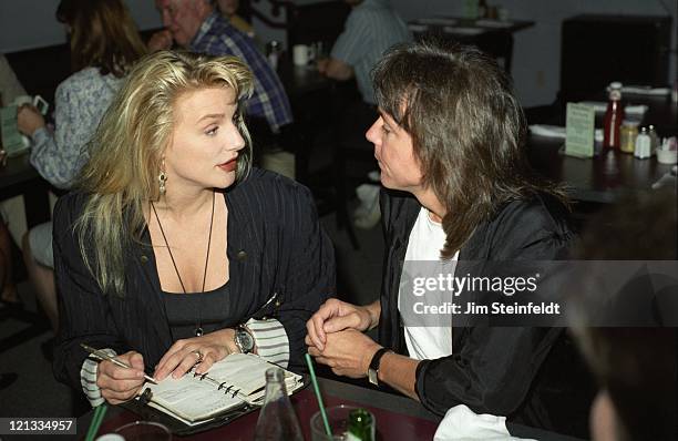 Eleanor Mondale and David Cassidy exchange information in Minneapolis, Minnesota in 1994.