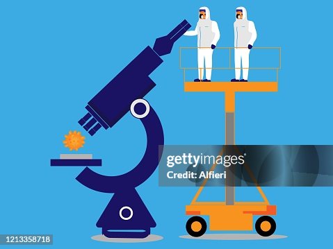 科學家通過顯微鏡觀察病毒。 科學家通過顯微鏡觀察病毒。