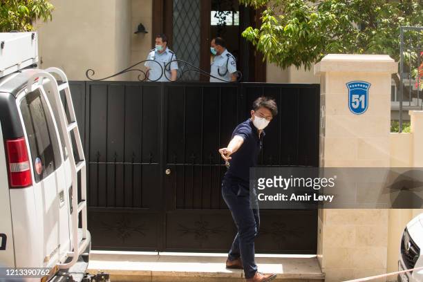 Israeli police enter the house of China's Ambassador to Israel Du Wei, after he was found dead in his house on May 17, 2020 in Herzliya, Israel. Du...