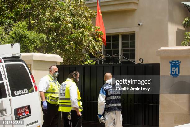 Israeli police enter the house of China's Ambassador to Israel Du Wei, after he was found dead in his house on May 17, 2020 in Herzliya, Israel. Du...