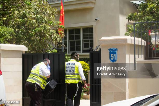 Israeli police enter the house of China's Ambassador to Israel Du Wei, after he was found dead in his house on May 17, 2020 in Herzliya, Israel. Du...