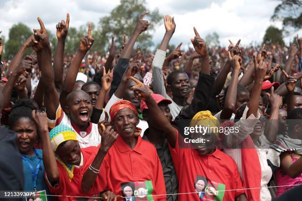 Supporters react during the address of Agathon Rwasa, the presidential candidate of the main opposition party the National Congress for Liberty ,...