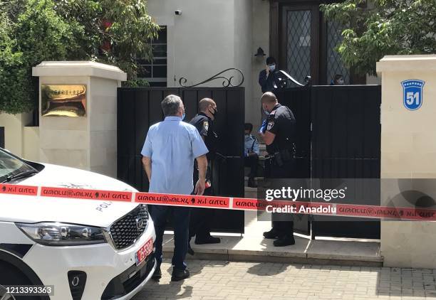 Police officers inspect the residence of China's embassy after Chinaâs ambassador to Israel Du Wei was found dead in his home in Herzliya, Israel on...