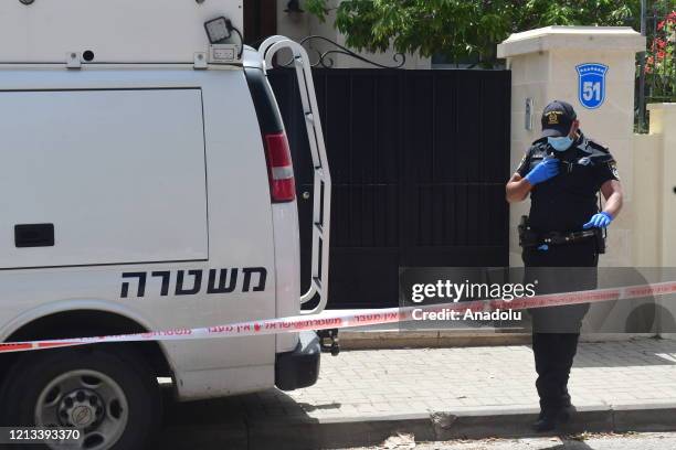 Police officers inspect the residence of China's embassy after Chinaâs ambassador to Israel Du Wei was found dead in his home in Herzliya, Israel on...