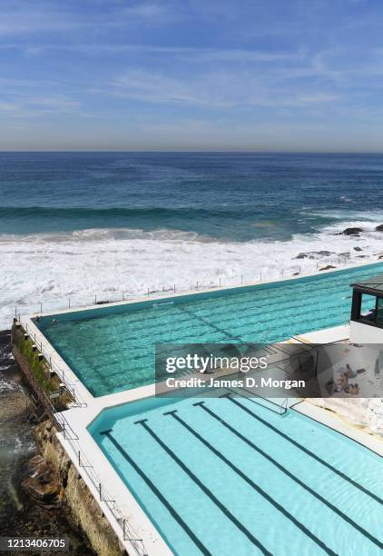 People enjoying a swim at Icebergs pool at Bondi Beach on March 19, 2020 in Sydney, Australia. Non-essential gatherings of 100 or more people indoors...