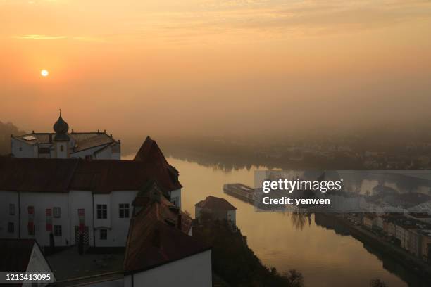 sunrise in passau germany - niederbayern stock-fotos und bilder