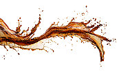Isolated image of cola splash across a white background