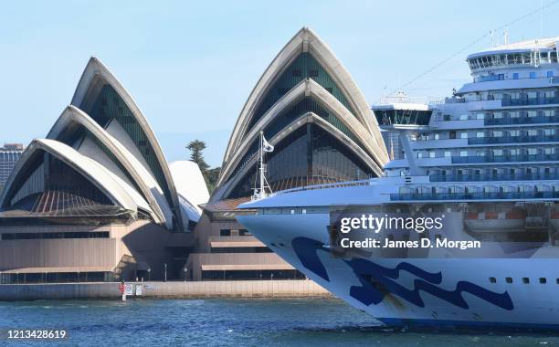 Ruby Princess belonging to cruise ship company Princess Cruises, departs Sydney Harbour with no passengers and only crew on board as it passes the...