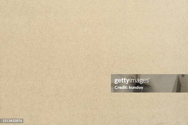abstract background from texture of brown paper. vintage style backdrop. - paper board stock-fotos und bilder