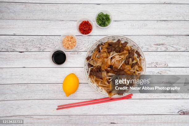 steak hor fun. - hoisin sauce stock pictures, royalty-free photos & images