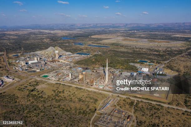This aerial view shows the Sibanye-Stillwater platinum mine in Marikana, near Rustenburg, on May 15, 2020. - The mines are a critical cog in South...