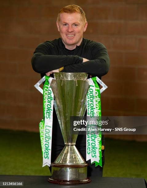 Manager Neil Lennon is pictured with the Ladbrokes Premiership trophy as Celtic are announced by the SPFL as title winners for the 2019/2020 season.