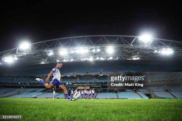 Brendon Wakeham of the Bulldogs takes a conversion attempt during the round 2 NRL match between the Canterbury Bulldogs and the North Queensland...