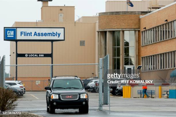 The General Motors Flint Assembly plant is seen on May 18, 2020 in Flint, Michigan. - This plant produces Heavy-Duty Chevrolet and GMC Sierra Crew...