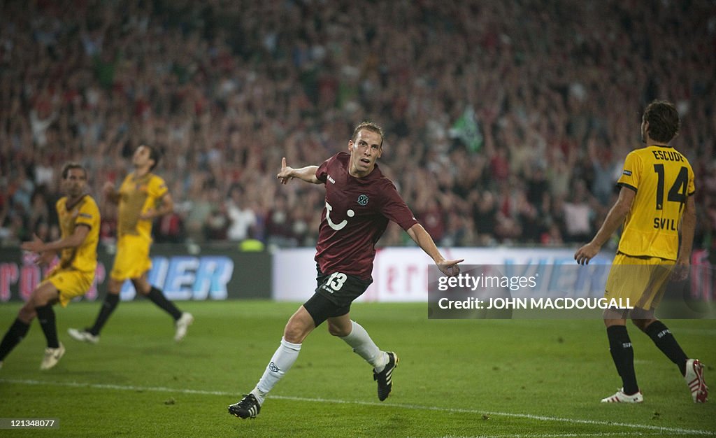 Hanover's striker Jan Schlaudraff celebr