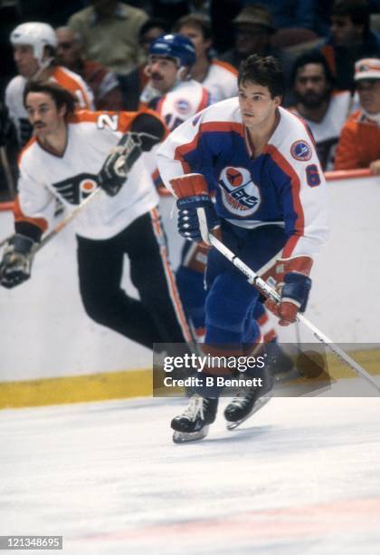 Barry Legge of the Winnipeg Jets skates with the puck during an NHL game against the Philadelphia Flyers on December 1, 1981 at the Spectrum in...