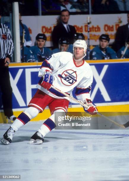Dave Manson of the Winnipeg Jets skates on the ice during an NHL game against the San Jose Sharks circa 1995 at the Winnipeg Arena in Winnipeg,...